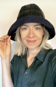Lady wearing oilskin tartan hat made from digital download pattern
