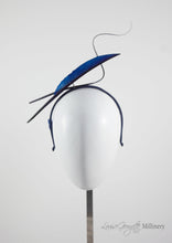 Navy two quill headband or fascinator. Front view. Handmade millinery made in London.