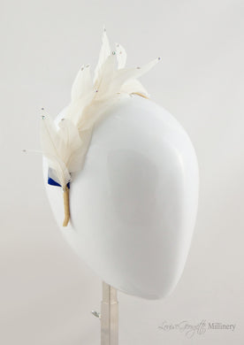 Ivory feathered headband with diamanté details.
