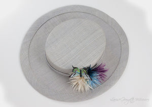 Top view Silver / Grey Boater with Aster feather flowers and butterfly
