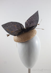 Cream straw hat with gold feathers and black bow. Suitable for weddings, special occasions and race days. A popular straw style, our signature fun and timeless hat suits most face shapes and can be made in bespoke colours upon request.