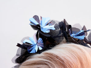 Black and Metallic silver flower crown on headband. Close up. Handmade millinery made in London.