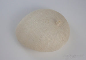 Ivory straw beret hat with. Suitable for bridal wear or royal ascot. Top view