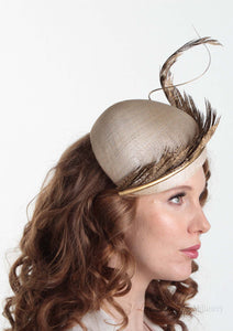 Allegra gold feathered straw Beret on model. Millinery handmade in London. Side view.
