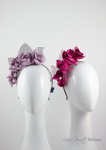 Leather roses on headband with reflective lattice detail. Millinery handmade in London. Front view. Pink and Lilac