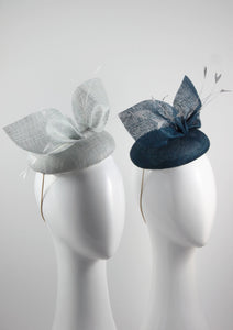 Royal and Ice Blue pinokpok pillboxs with bow and feather detail. Handmade Millinery made in London - Louise Georgette Millinery Front view.