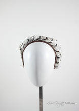 Ivory and Brown/Black stripped feather headband. Front view. Handmade millinery made in London.