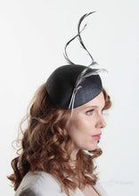 Navy two feather Beret. Millinery handmade in London. Model side view.