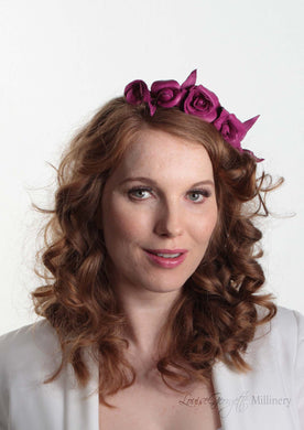 Mini Rosie Cerise Flower Crown for weddings and special occasions. Front view on model.