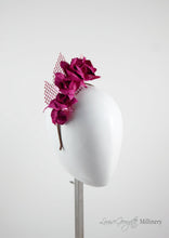 Leather roses on headband with reflective lattice detail. Millinery handmade in London. FSide view. Pink
