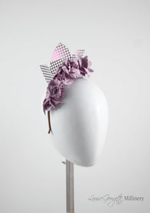 Leather roses on headband with reflective lattice detail. Millinery handmade in London. Front view. Pink side view