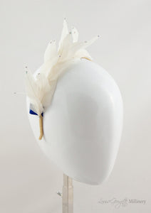 Ivory feathered headband with diamanté details.