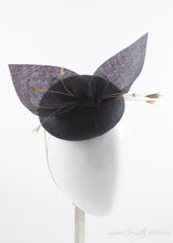 Black straw hat with gold feathers. Suitable for weddings, special occasions and race days. A popular straw style, our signature fun and timeless hat suits most face shapes and can be made in bespoke colours upon request.