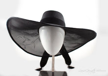 Etta black wide brimmed hat with leaf detail