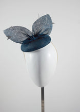 Blue pinokpok pillbox with bow and feather detail. Handmade Millinery made in London - Louise Georgette Millinery Front view.