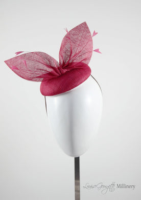 Red straw bow hat with feathers.Front view. Royal Ascot, Royal enclosure approved. Millinery handmade in London. Louise Georgette Millinery