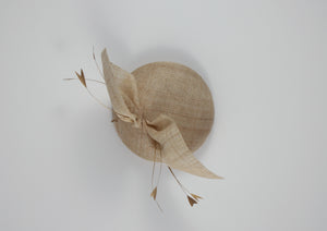 Beige / Natural straw hat with gold feathers. Suitable for weddings, special occasions and race days. A popular straw style, our signature fun and timeless hat suits most face shapes and can be made in bespoke colours upon request.