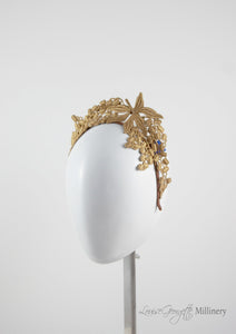 Beautiful tiara style gold lace headband. Suitable for racing events, brides and bridesmaids. side view. 