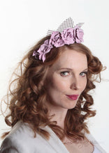 Rosie pale lilac leather flower crown on lattice. Model side view. Millinery handmade in London.