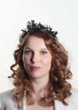 Front facing view. Sylvie metallic flower crown in black and gunmetal
